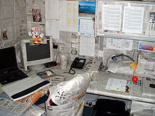 Take newspaper and wrap everything in your co-workers office