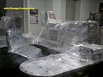 Take plastic wrap and wrap everything in your co-workers office